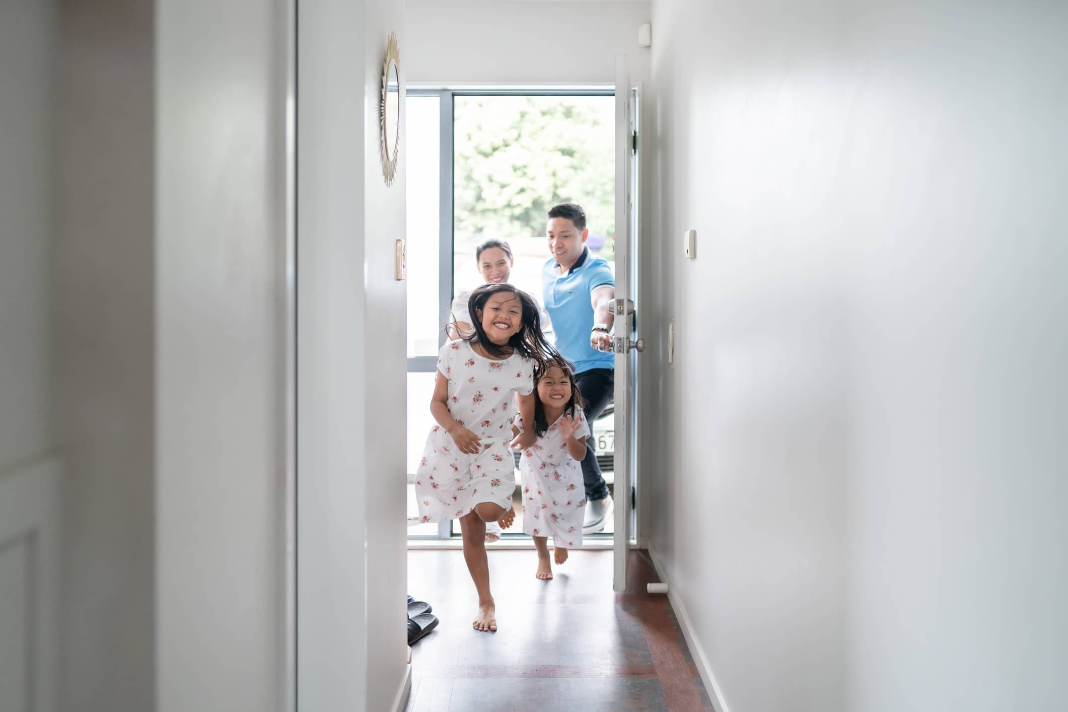 kids running into new house